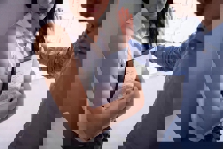 Woman being harassed by a co-worker