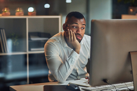 stressed person at work at night