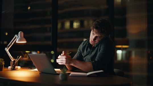 employee working overtime in office